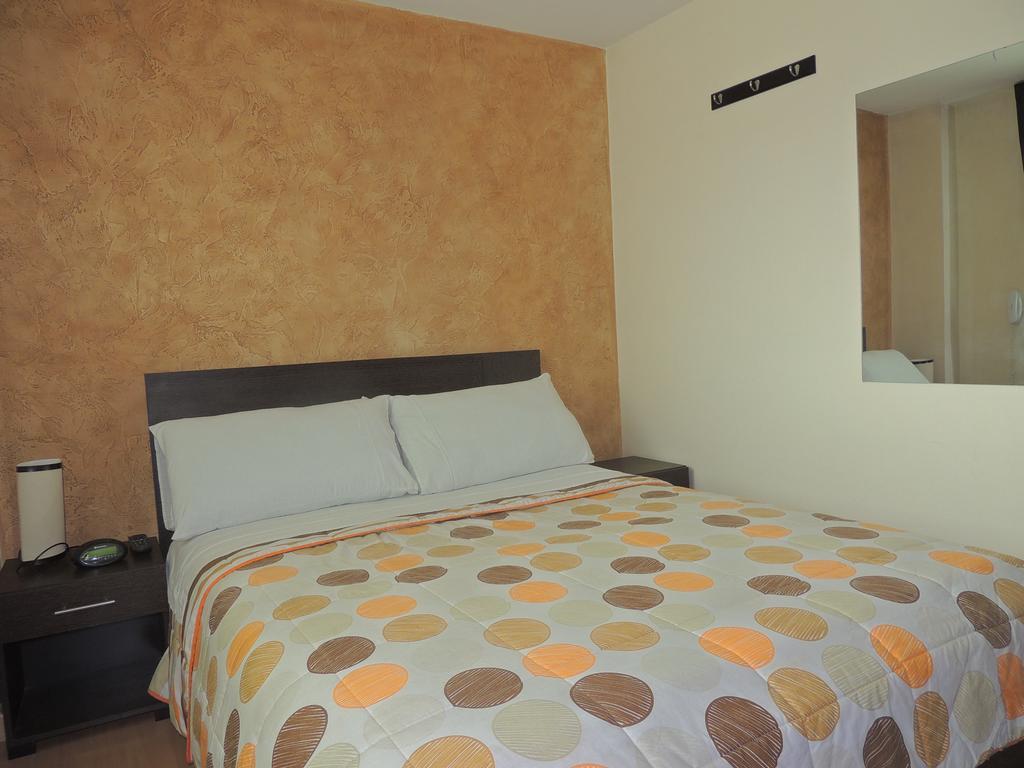 Titan Hotel & Spa Bogotá Szoba fotó